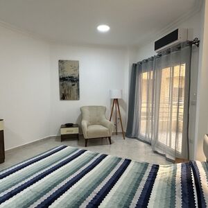 Spacious and Bright 1-Bedroom Apartment with Private Beach A